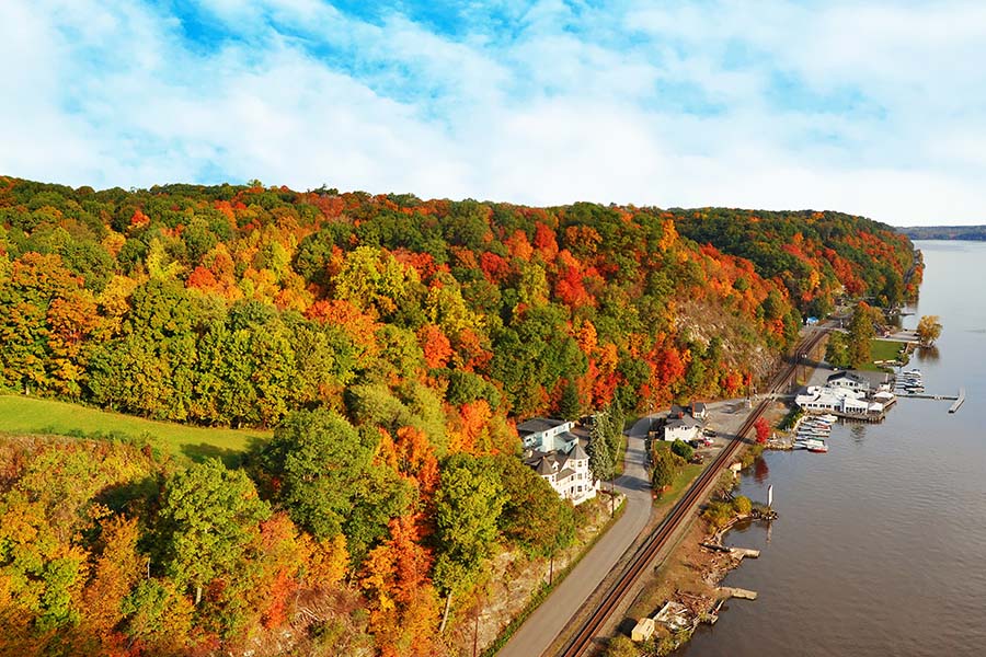 Mount Kisco NY - Scenic View of a Dock Along the Hudson River in Mount Kisco New York Surrounded by Colorful Fall Foliage